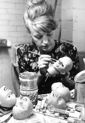 Judith working on puppet heads